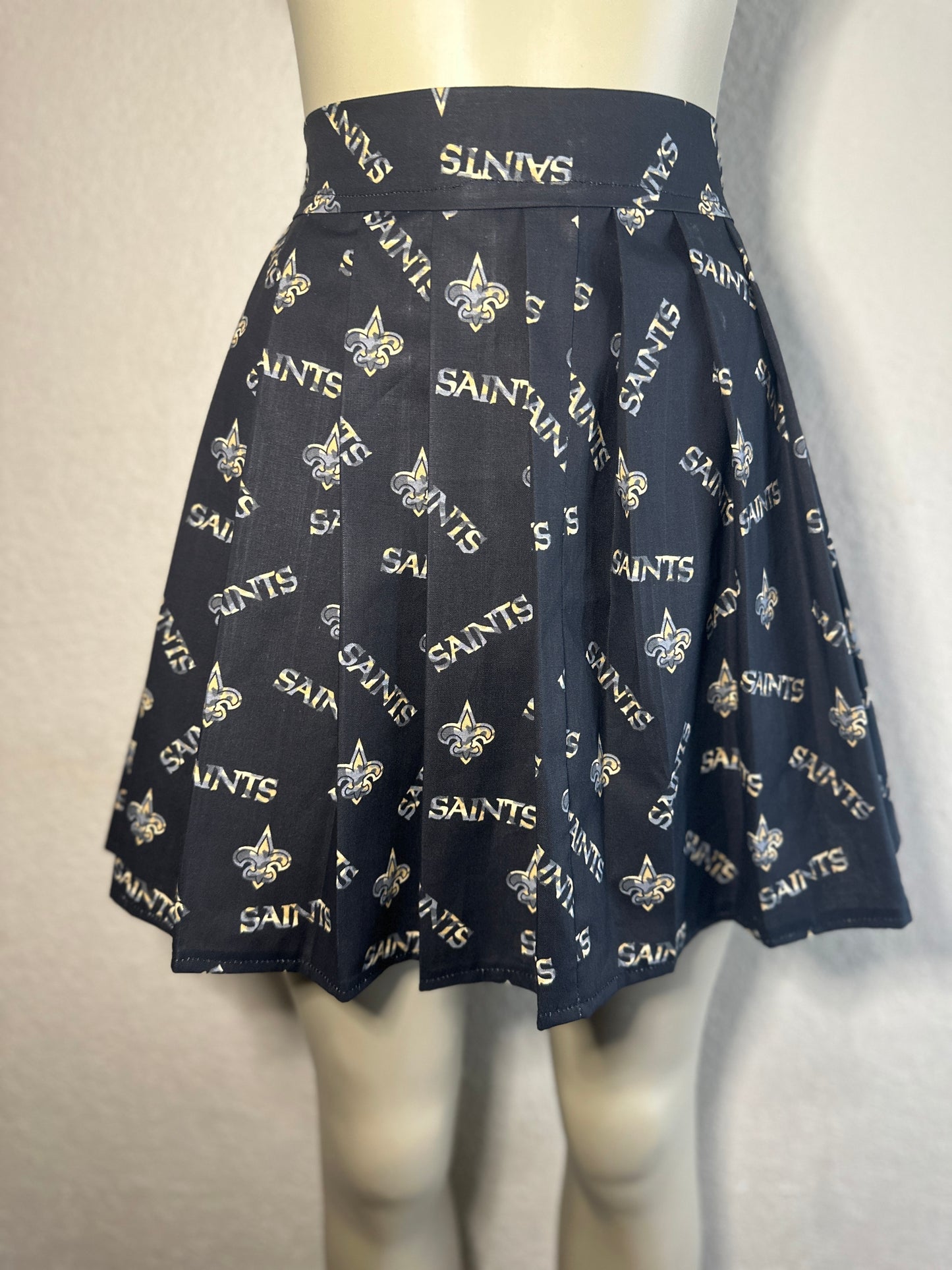 4. Saints Box Pleated Skirt