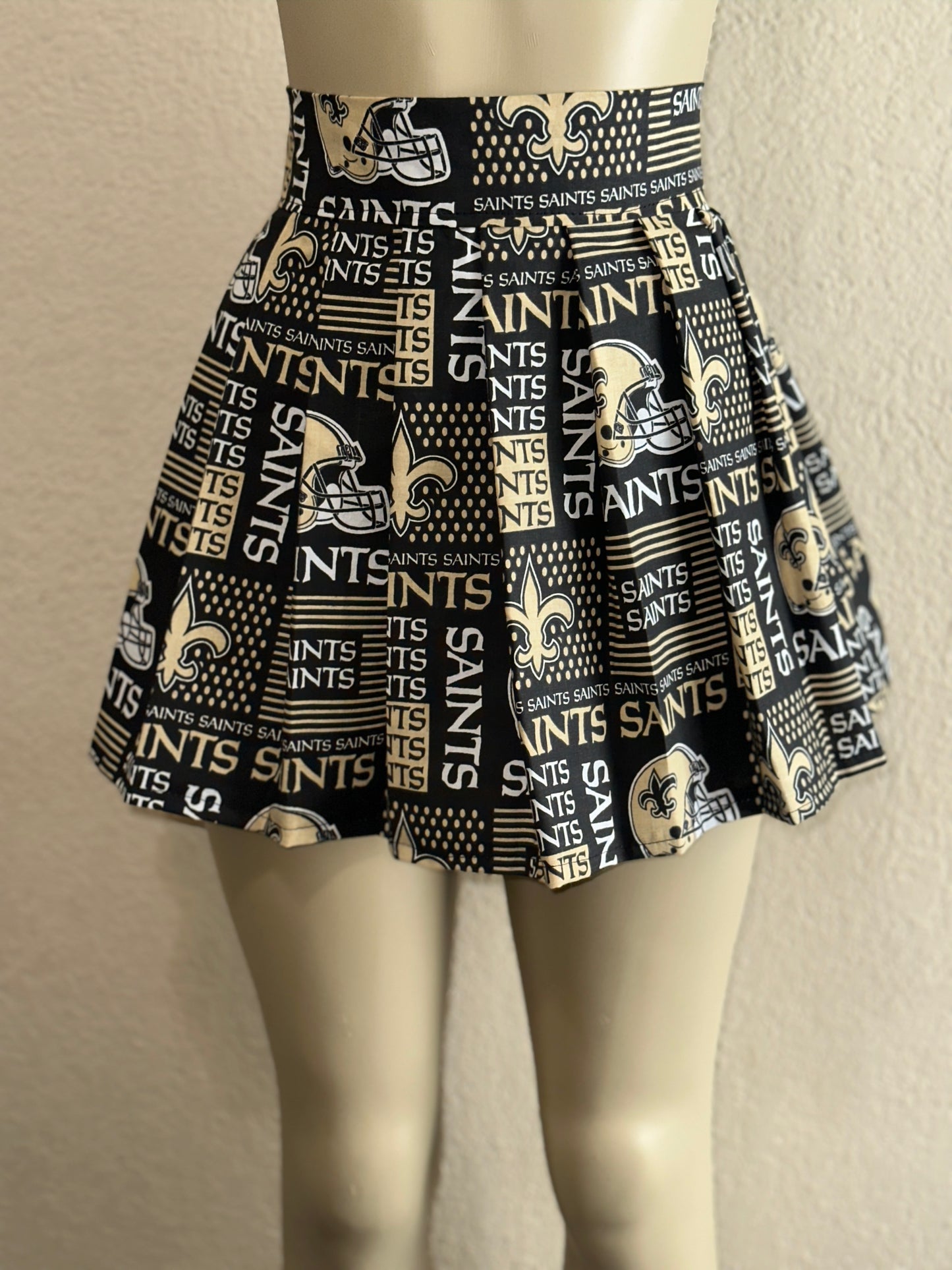 1. Saints Knife Pleated Skirt