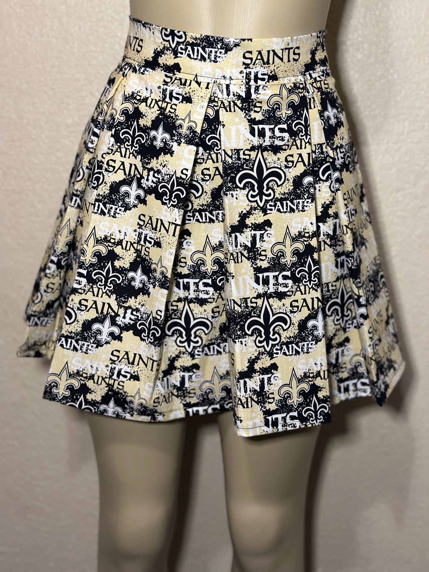 2. Saints Box Pleated Skirt